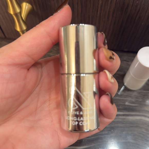 Olive & June Nail Polish- The Topcoat and 
STELLAR LONG LASTING POLISH - Picture 3 of 15